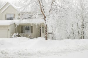 house-covered-in-snow-and-ice